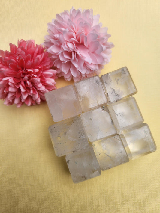 Polished Clear Quartz Cube crystal featuring natural transparent quartz with a smooth geometric cube shape. Clear Quartz is known as the master healer and is associated with clarity, focus, energy amplification, manifestation, meditation, crystal grids, and spiritual practices. Beautiful polished crystal cube for home decor, desk display, chakra work, crystal collections, mindfulness, energy cleansing, and thoughtful crystal gifts. Natural Clear Quartz gemstone.