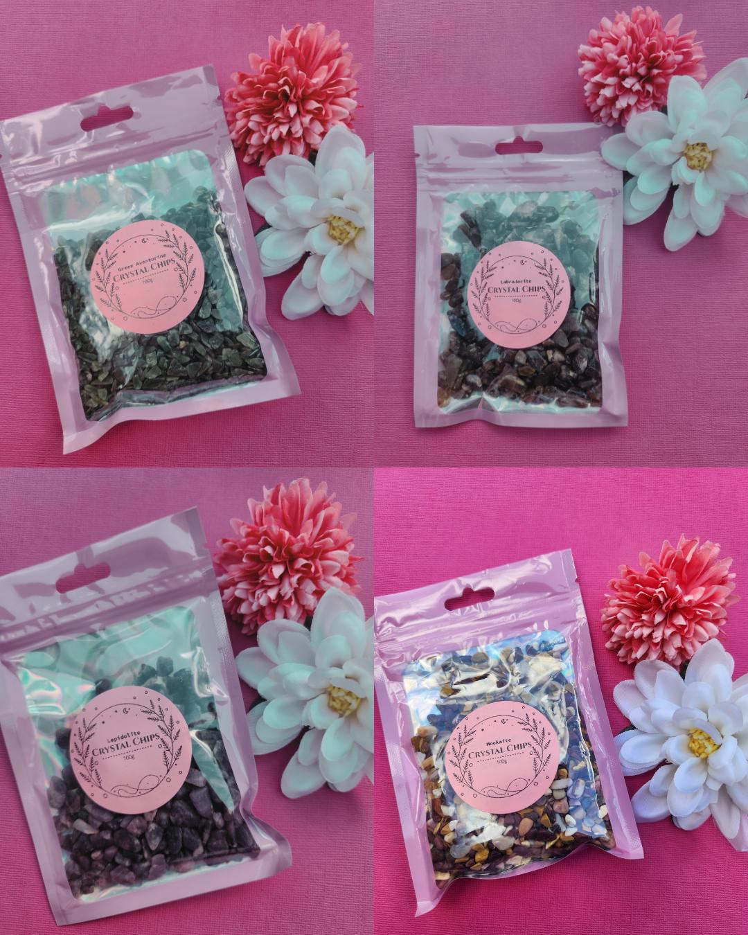 Collage image of 100g crystal chip bags featuring Green Aventurine, Labradorite, Lepidolite and Mookaite, natural gemstone chips for jewellery making and creative crafts, raw crystal chips for resin art and crystal grids, healing crystals for luck intuition calm and emotional balance, mixed gemstone chip bags photographed together