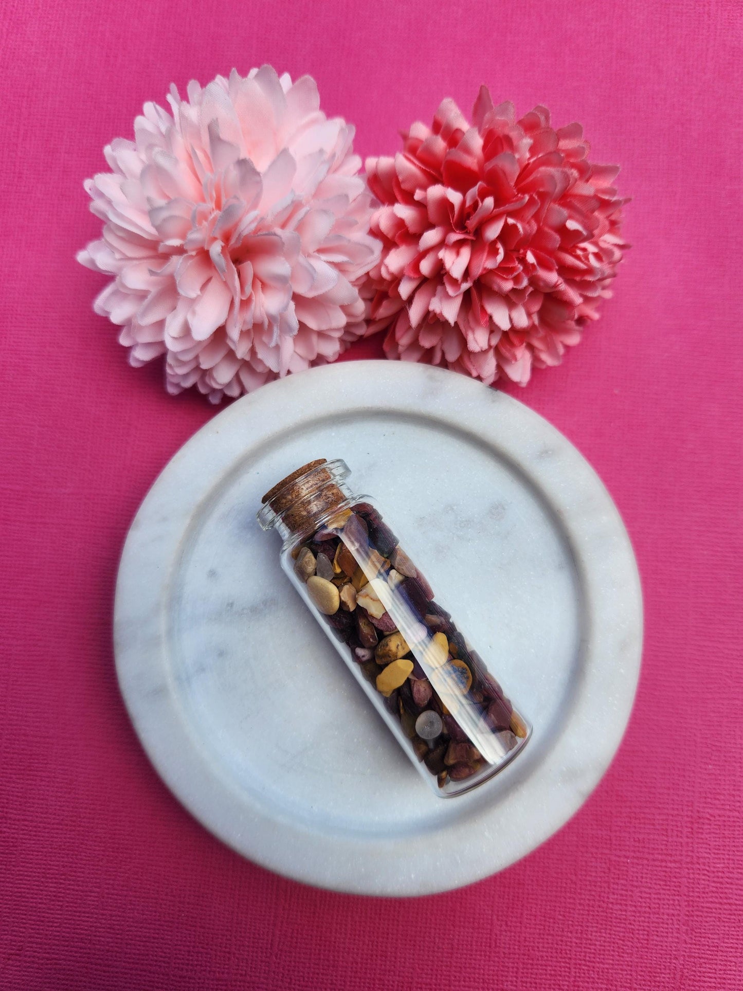 Mookaite crystal chip wish bottle filled with natural mookaite gemstone chips in earthy tones, mini glass bottle crystal for grounding strength and emotional balance, healing crystal chips, mookaite wish bottle for spiritual decor and gifting